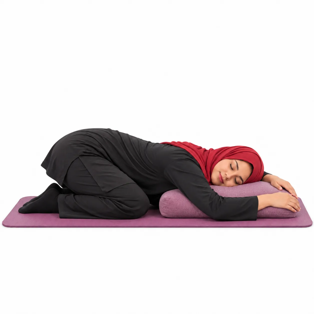 Illustrative image, not a real patient. A woman kneeling with her chest and arms resting over a cushion in a supported child's pose, breathing slowly.