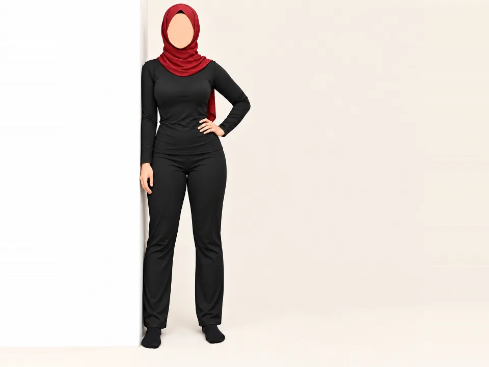 Woman in a red hijab standing beside a wall, pressing the outside of her knee into the wall with her hips level.