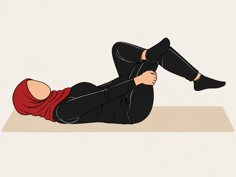 Woman in a red hijab lying on her back with one ankle crossed over the other knee, drawing the leg towards her.