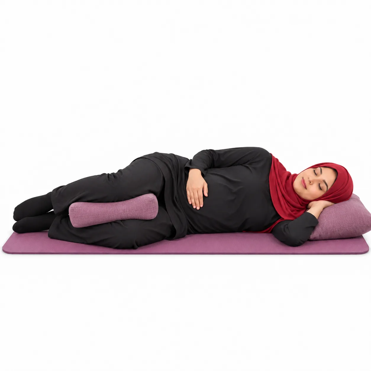 Illustrative image, not a real patient. A woman lying on her side on a mat with a cushion between her knees and a pillow under her head, one hand resting on her lower abdomen, resting calmly.